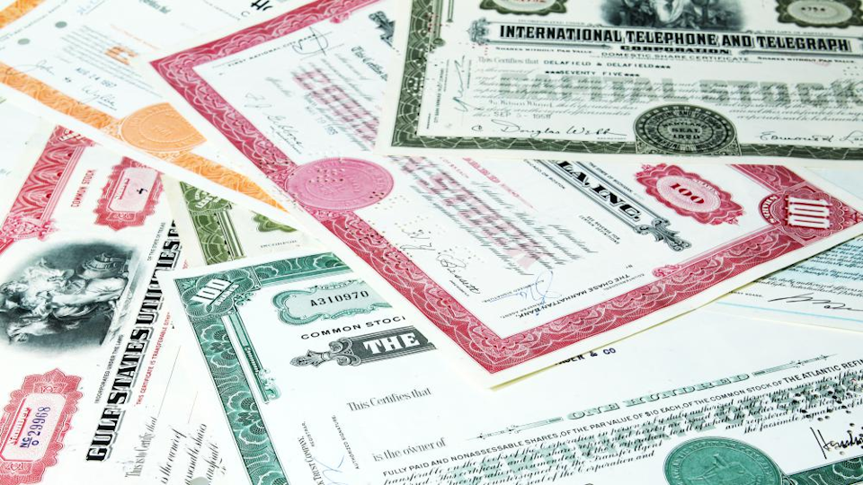 Graphic showing stock certificates